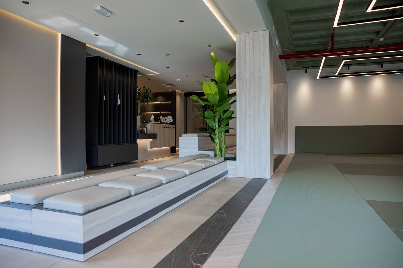 The mat space and seating at Alliance Jiu Jitsu Kuwait
